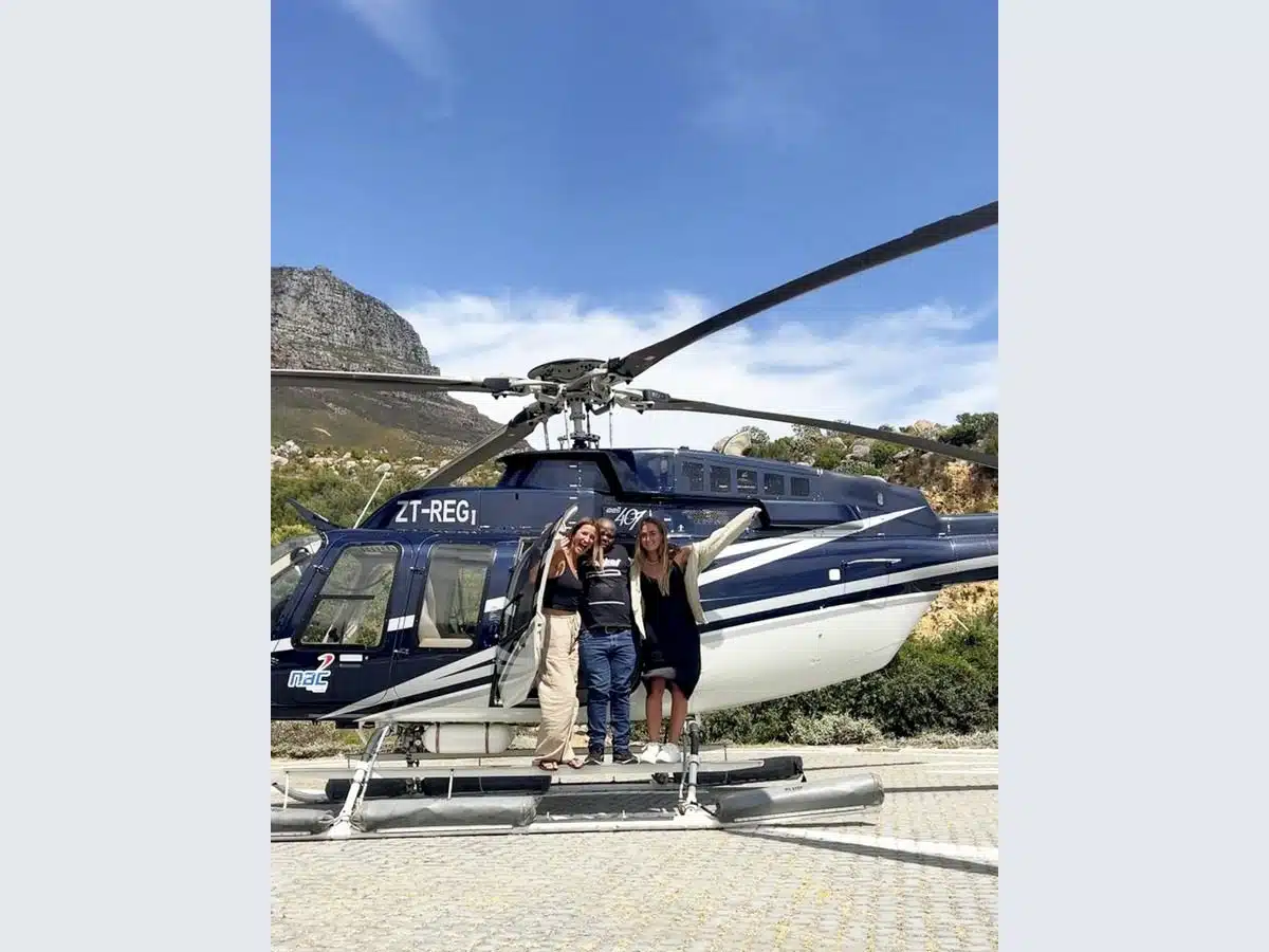 Two friends treat South African security guard to once in a lifetime helicopter ride over the rainbow nation