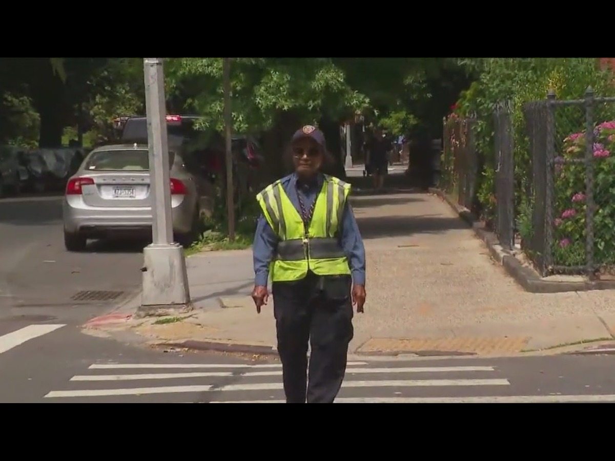 After over 45 years of standing at same intersection, NYC’s beloved crossing guard retires at 90