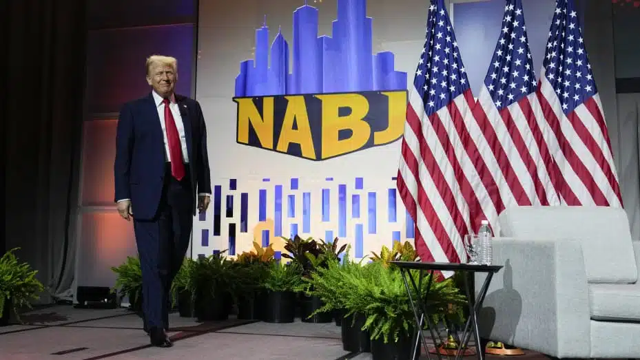 Republican presidential candidate former President Donald Trump walks on stage at the National Association of Black Journalists, NABJ, convention, Wednesday, July 31, 2024, in Chicago. Charles Rex Arbogast | AP