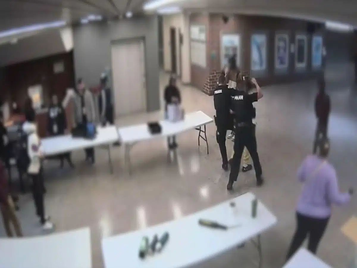 Surveillance video captures school resource officer in Akron punching student